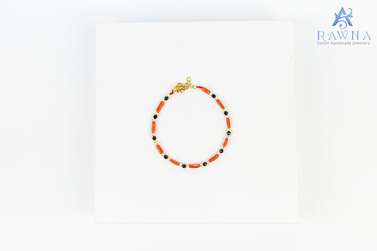 Bracciale artigianale RAWNA con corallo rosso naturale e onice nero