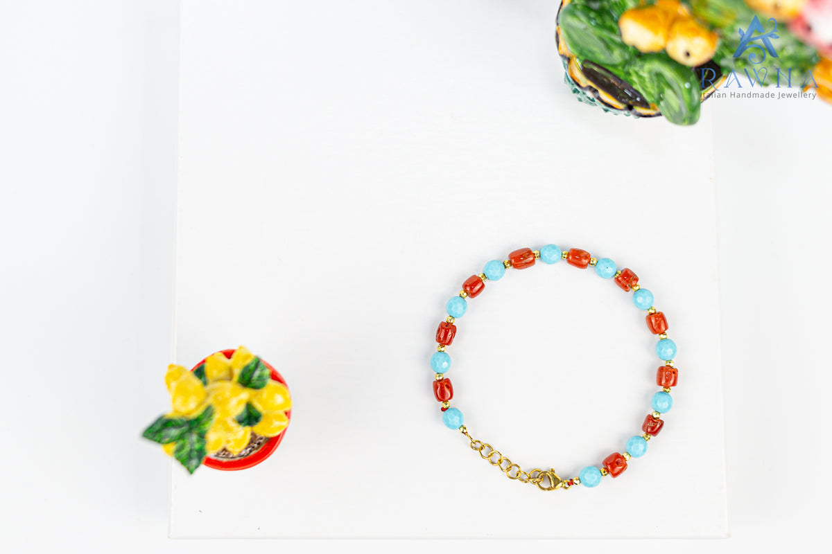 Bracciale artigianale RAWNA con corallo naturale, pasta di turchese ed ematite