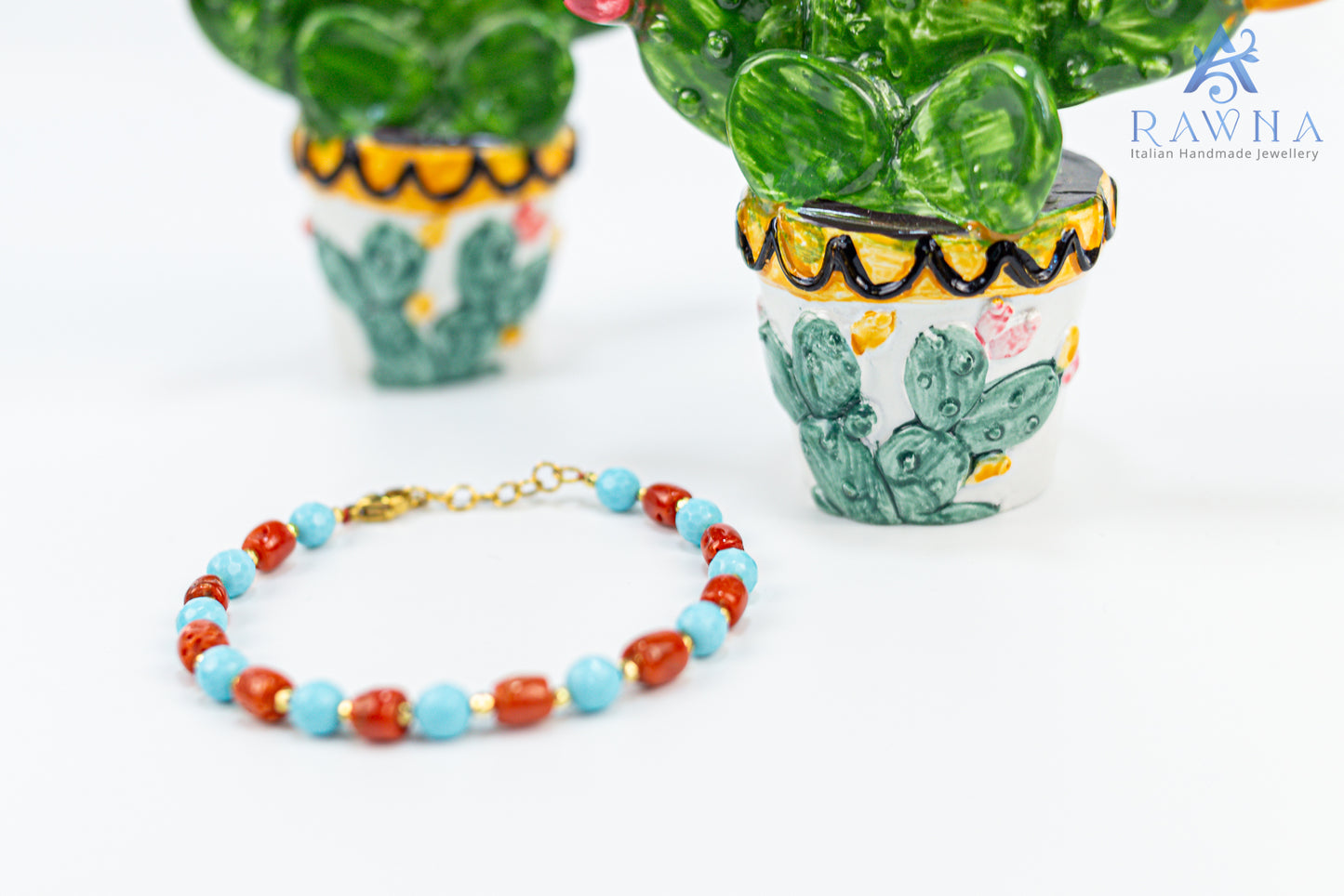 Handcrafted bracelet with natural coral and four-flower turquoise paste